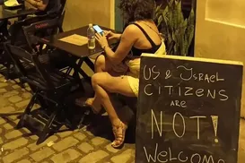 Bar tem cadastro cancelado por barrar israelenses e americanos - Imagem