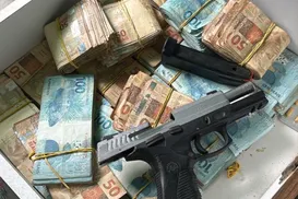 Rinha de galo termina com apreensão de arma e R$ 150 mil em dinheiro - Imagem