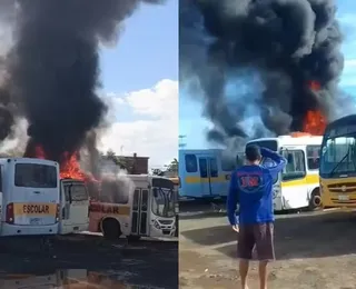 Incêndio atinge ônibus escolares ao lado de posto de combustível