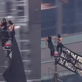 Casal é preso após escalar topo de prédio em Nova York para protestar imagem
