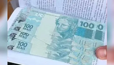 Homem é preso ao retirar pacote com notas falsas nos Correios