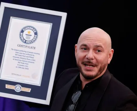 Pitbull entra para o livro dos recordes por maior encontro de carecas - Imagem