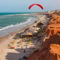Paraíso do Nordeste vira queridinho dos turistas com praias vermelhas imagem