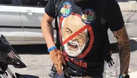 Aliado de Flávio Bolsonaro exibe arma durante confusão com candidato do PSOL