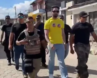 Vídeo: Rico vota cercado por seguranças e revela mudança de país