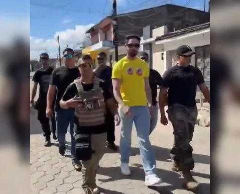 Vídeo: Rico vota cercado por seguranças e revela mudança de país - Imagem