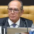 STF em alerta: Gilmar cobra lei após ataques a Moraes imagem