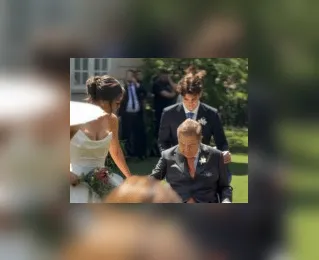 Faustão aparece de cadeira de rodas no casamento da filha