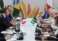 Entre Promessas Globais e Contradições Locais