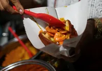 Garota morre após comer acarajé