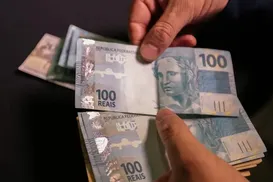 Como o 13º pode te ajudar a pagar IPVA e IPTU de 2026 - Imagem