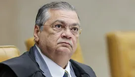 Dino manda PF investigar apoio dos EUA à campanha de Flávio Bolsonaro