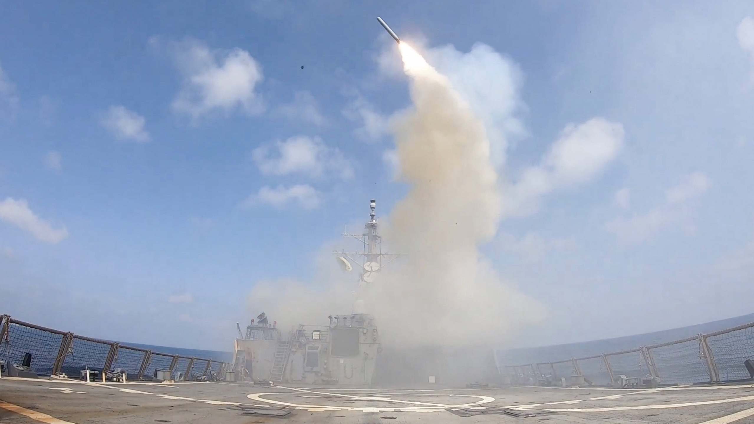 In this screen grab obtained on February 28, 2026 from video released by the US Central Command on their X account @CENTCOM shows the Arleigh Burke class guided-missile-destroyer, USS Spruance (DDG 111), firing Tomahawk Land Attack Missiles in support of Operation Epic Fury, from an undisclosed location on February 28, 2026. The United States and Israel launched a wave of strikes against targets in Iran on February 28, sparking swift retaliation by the Islamic republic which responded with missile attacks across the region. (Photo by US Central Command (CENTCOM) / AFP) / RESTRICTED TO EDITORIAL USE - MANDATORY CREDIT "U.S. CENTCOM - HAND-OUT" - NO MARKETING NO ADVERTISING CAMPAIGNS - DISTRIBUTED AS A SERVICE TO CLIENTS
