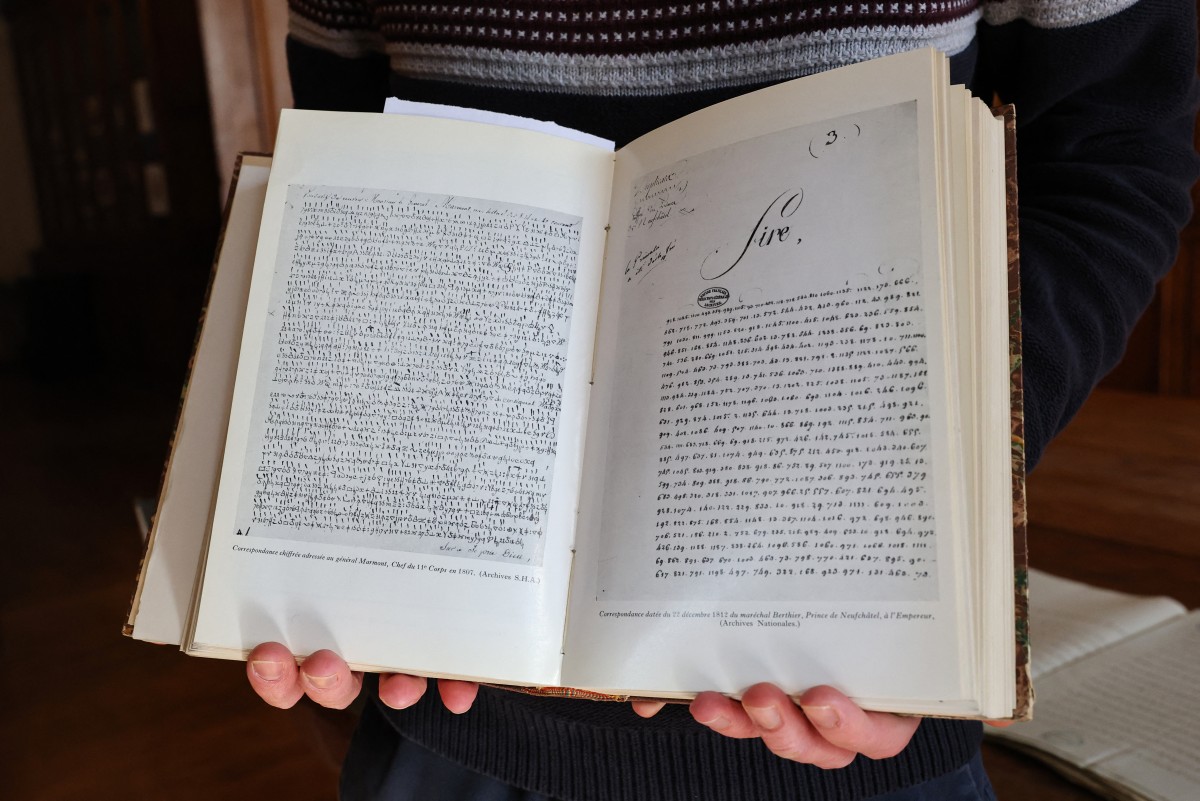 This photograph taken at military archives at the Vincennes castle, outside Paris, on October 15, 2026 shows of a reproduction of a wartime letter addressed to one of Napoleon's generals written in secret code in 1809, detailing the positions of French troops. The message remained an unsolved mystery for more than 200 years until artificial intelligence deciphered it in just a few hours. (Photo by Anne-Christine POUJOULAT / AFP)