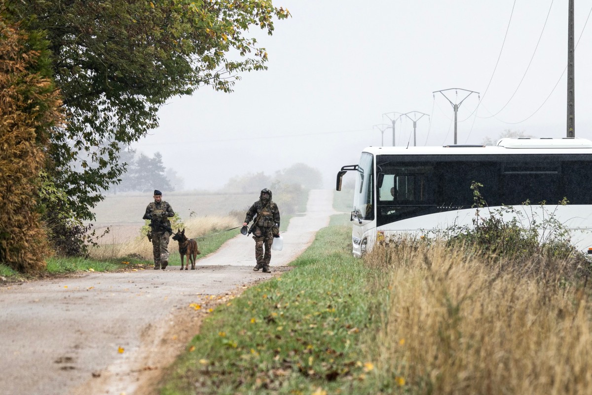 French military personnel take part in a rescue operation to search for a Mirage 2000D fighter jet that crashed during a training flight, in Tremblecourt, north-eastern France on October 21, 2026. A Mirage 2000D fighter jet crashed on October 20, 2026 evening near Nancy, in northeastern France, during a training flight in difficult weather conditions, leaving at least one person dead, while the other crew member remains the subject of a search. (Photo by ROMEO BOETZLE / AFP)