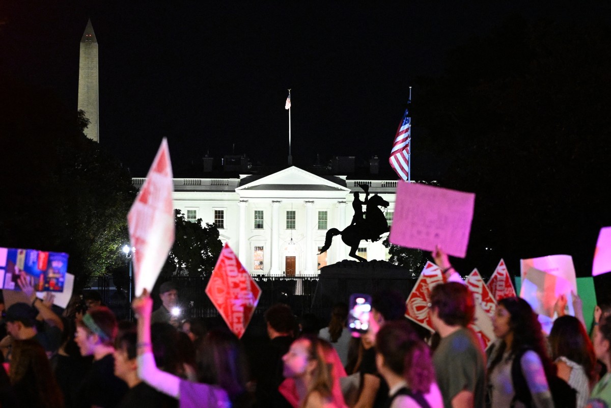 Manifestantes do movimento feminista *Women's March* (Marcha das Mulheres) protestam nas proximidades da Casa Branca, em Washington, D.C.