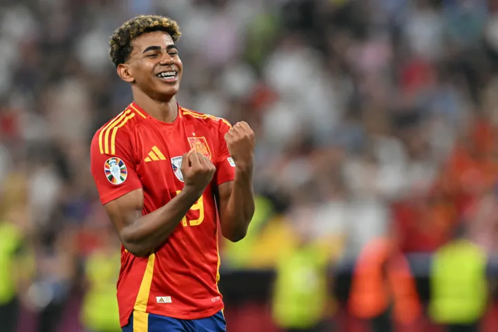 Spain's forward #19 Lamine Yamal celebrates at the end of the UEFA Euro 2024 semi-final football match between Spain and France at the Munich Football Arena in Munich on July 9, 2024. (Photo by MIGUEL MEDINA / AFP)