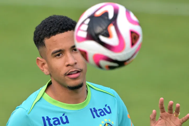 Brazil's forward Savinho eyes the ball during a training session of the Brazil national football team at the Palmeiras team training center in Sao Paulo, Brazil, on October 8, 2024, ahead of FIFA World Cup 2026 qualifier football matches against Chile and Peru. (Photo by Nelson ALMEIDA / AFP)