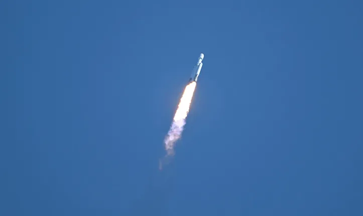 A SpaceX Falcon Heavy rocket with the Europa Clipper spacecraft aboard launches from Launch Complex 39A at NASA's Kennedy Space Center in Cape Canaveral on October 14, 2024. The spacecraft Clipper will soon launch for Jupiter's moon Europa, one of dozens of moons orbiting the Solar System?s biggest planet and the nearest spot in our celestial neighborhood that could offer a perch for life. It should reach orbit around Jupiter and Europa in 2031, where it will begin a detailed study of the moon scientists believe is covered in frozen water, which could provide a similar habitat to Earth. (Photo by CHANDAN KHANNA / AFP)