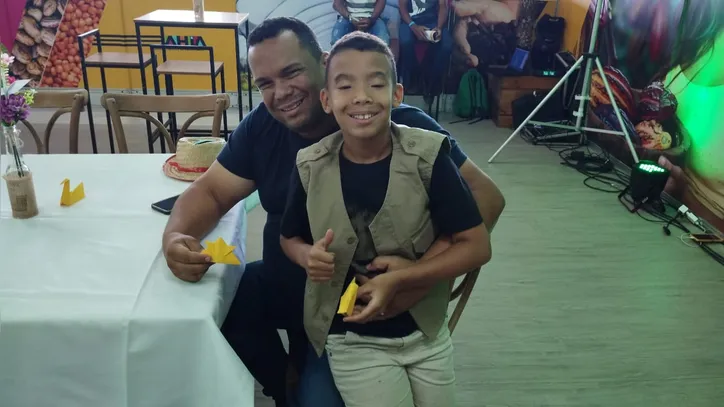 Tiago Corrêa, de 9 anos e seu pai