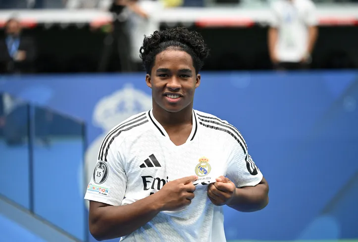 Brazilian forward Endrick Felipe poses during his first appearance as a new Real Madrid player at The Santiago Bernabeu Stadium in Madrid on July 27, 2024. (Photo by JAVIER SORIANO / AFP)