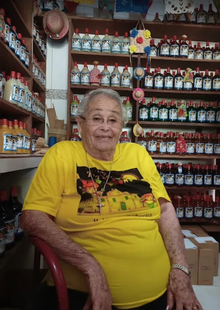 Imagem ilustrativa da imagem Tia Nem: 100 anos de vida e ícone na fabricação do licor de Cachoeira