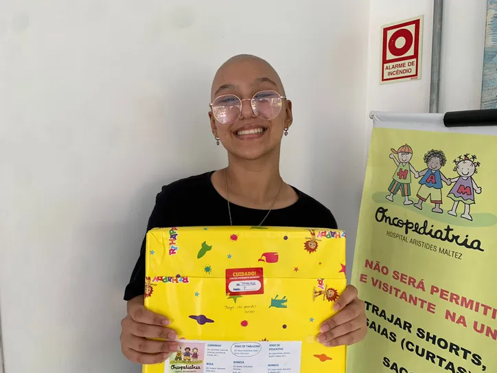 Imagem ilustrativa da imagem Crianças em tratamento oncológico recebem presentes de Natal